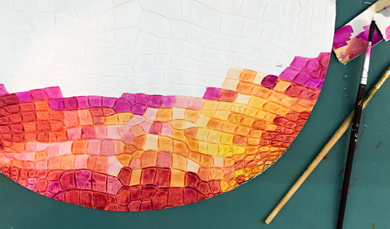 Hand dyeing alligator skin